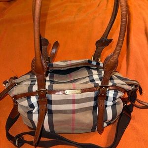 Vintage Burberry canvas and leather diaper bag with changing pad.